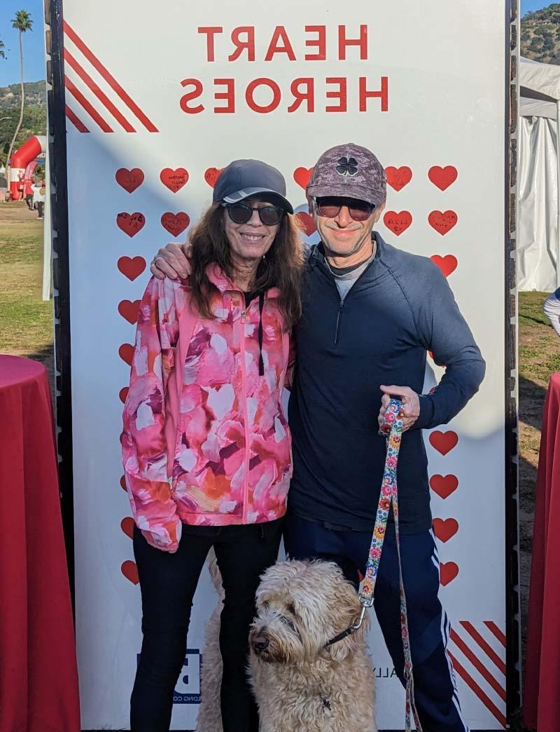 Jonathan Bogner (left) and his wife, Cindy, with their dog at an American Heart Association Heart and Stroke Walk. (Photo courtesy of Jonathan Bogner)